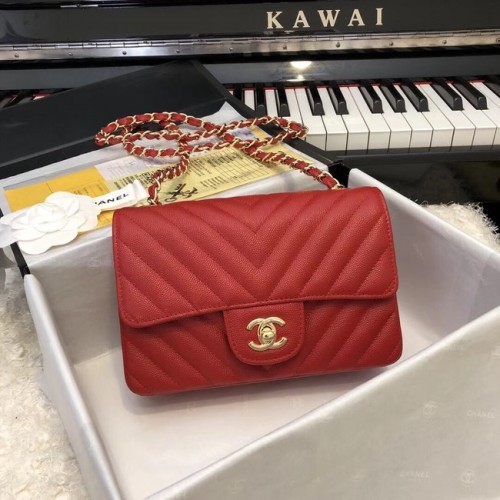 Chanel Petit sac à main classique Veau grainé Métal doré A69900 rouge