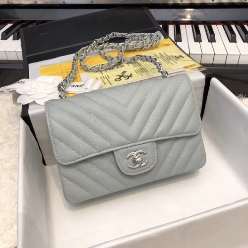 Chanel Petit sac à main classique Cuir de veau grainé Métal argenté A69900 gris