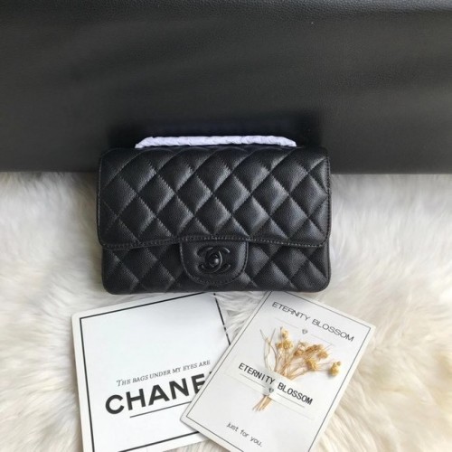 Chanel mini sac à rabat Cuir de veau grainé & métal noir A1116 noir