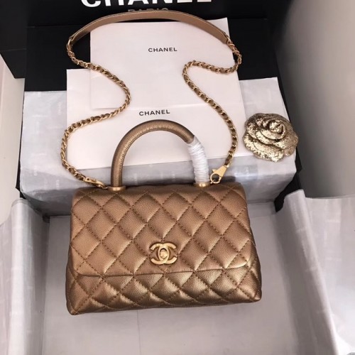 Chanel sac à rabat en cuir Caviar original poignée supérieure A92290 bronze&Métal Doré