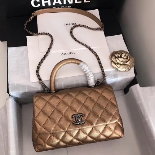 Chanel sac à rabat en cuir Caviar original poignée supérieure A92290 métal bronze et argent