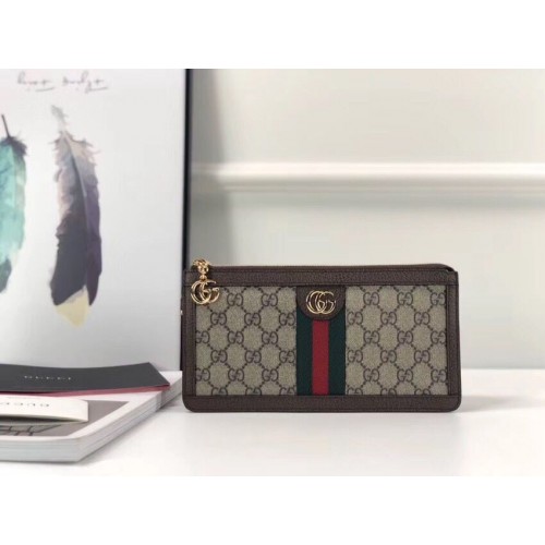 Pochette Suprême GG imprimé Gucci 524291