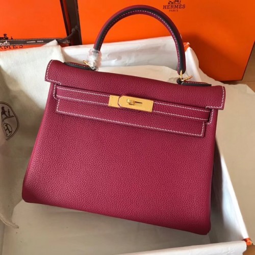 Sac kelly Hermès original en cuir Togo KL320 fuchsia