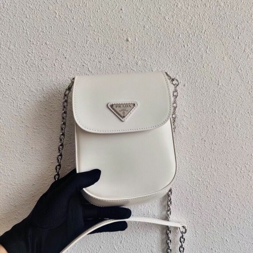 Prada Mini-sac en cuir brossé 1BH185 blanc