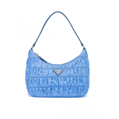 Prada Mini sac en nylon et cuir Saffiano 1NE204 bleu