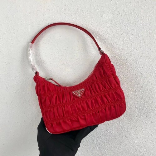 Prada Mini sac en nylon et cuir Saffiano 1NE204 rouge