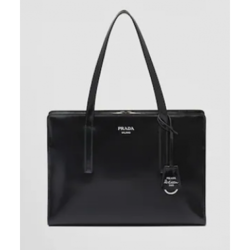 Prada Re-Edition 1995 sac à main moyen en cuir brossé 1BA350 noir
