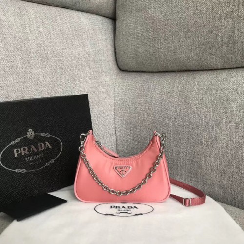 Prada Re-Edition 2005 mini sac à bandoulière en nylon 1BH203 rose