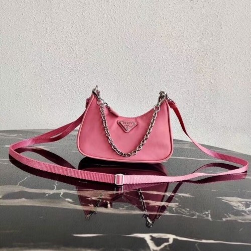 Prada Re-Edition mini sac à bandoulière en nylon 1TT122 rose
