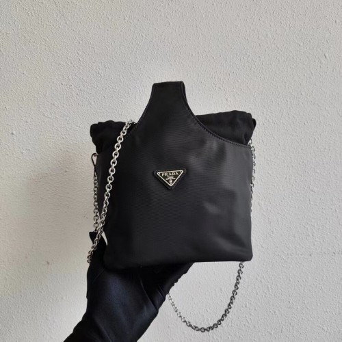 Prada Re-Nylon et sac à bandoulière en cuir Saffiano 1AG036 noir